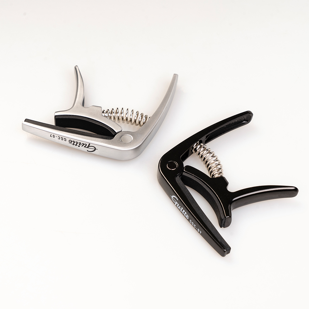 GUITTO GGC-07 Ukulele Capo Qui - مراجعة Musical Instrument Types وسعره