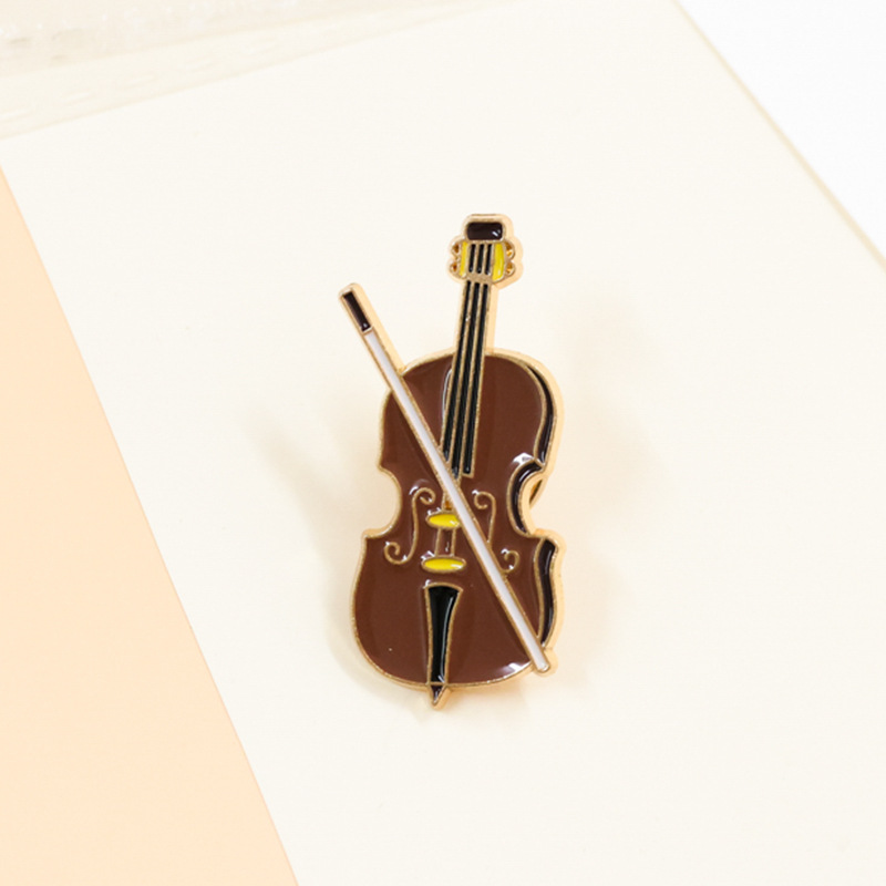 Cartoon Violin Enamel Pin Badg - مراجعة Musical Instrument Veena وسعره
